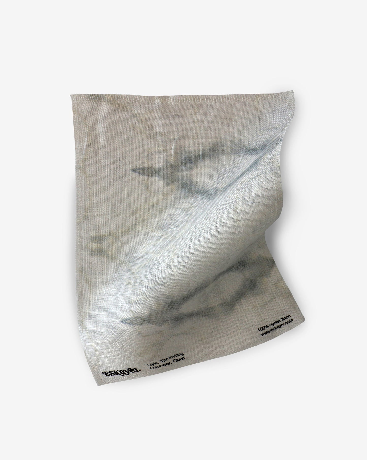 A white fabric with The Knitting Fabric Sample Cloud pattern on it