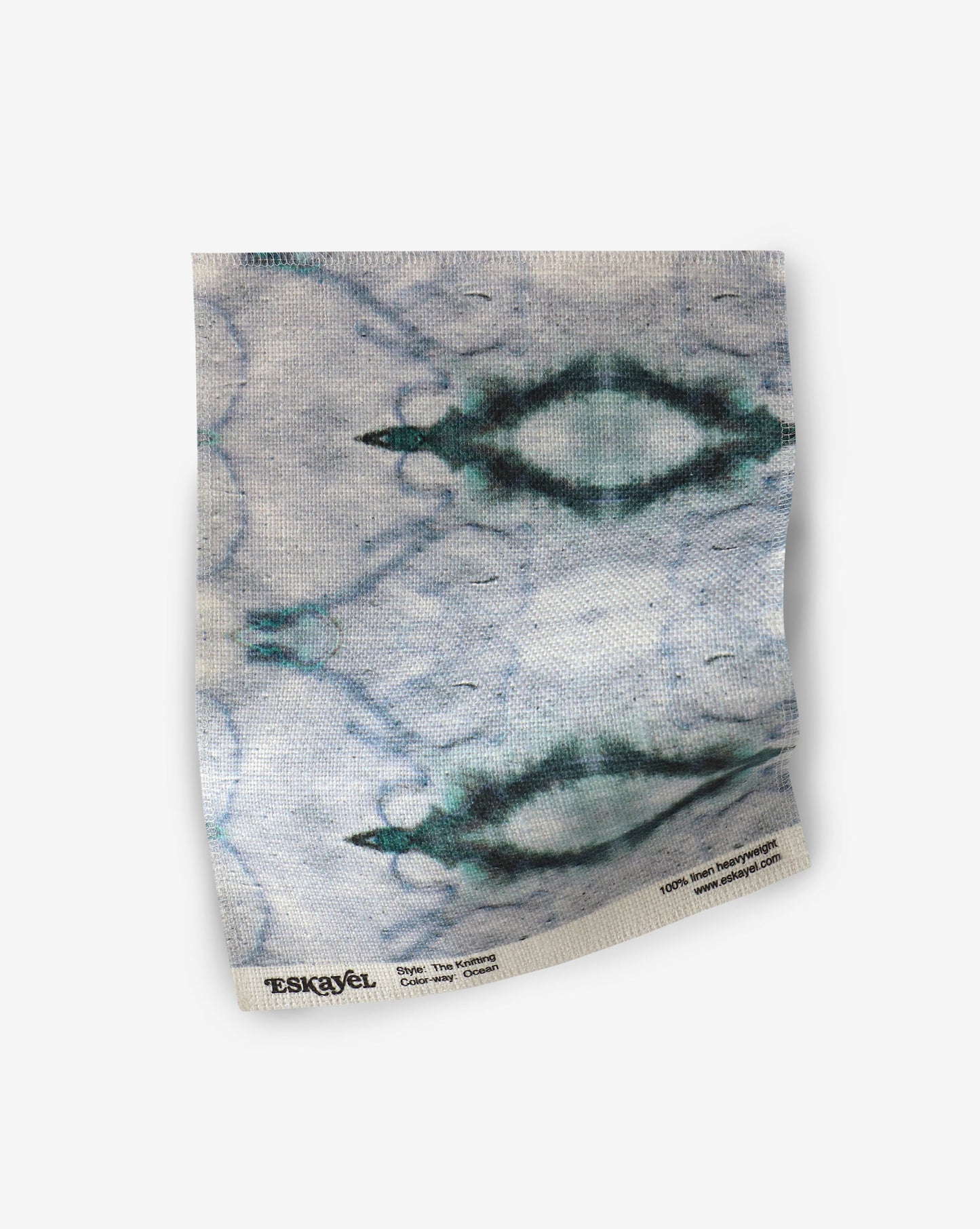 The Knitting Fabric Sample||Ocean towel with a blue and white pattern on it.