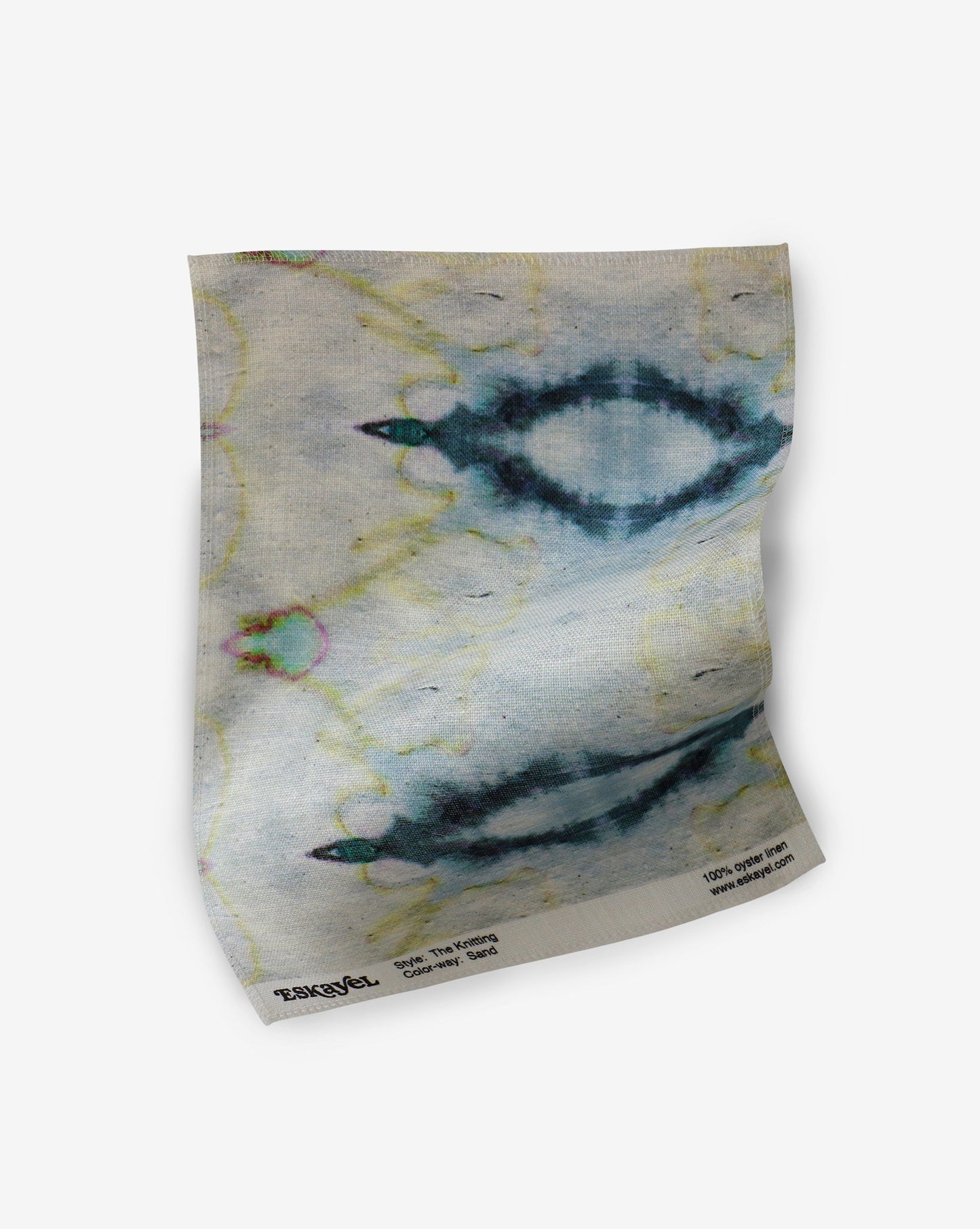 A blue tie dye pattern on a white background, made with luxury fabric from The Knitting Fabric Sand Collection