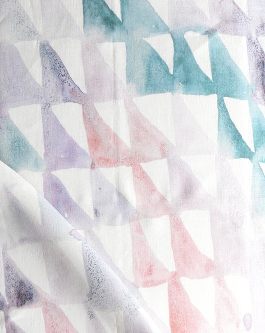 A close up of Triangle Checks Fabric in the Reef colorway
