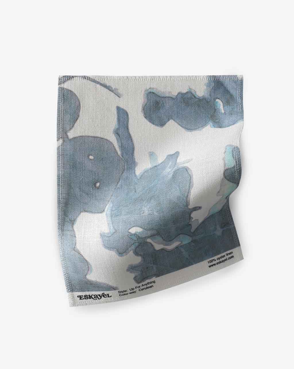 A fabric with the Up For Anything Fabric Cerulean design on it