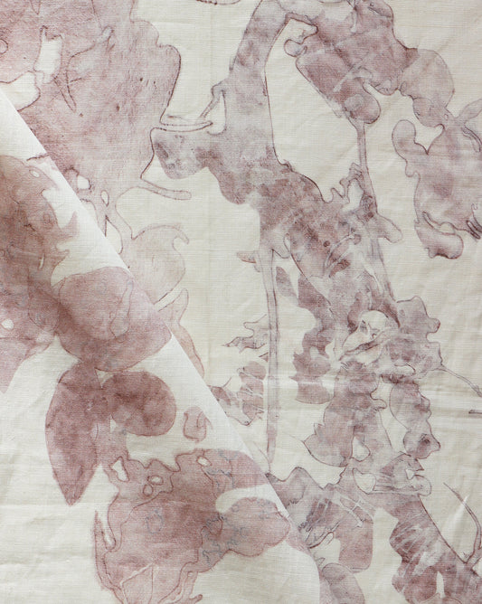 A close up of the Up For Anything Fabric Glimmer with abstract botanical patterns and vibrant colorway