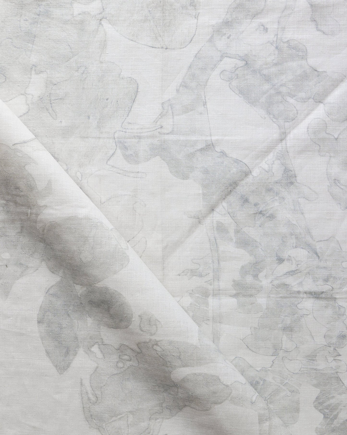A close up of Up For Anything Fabric Pearl with a botanical pattern