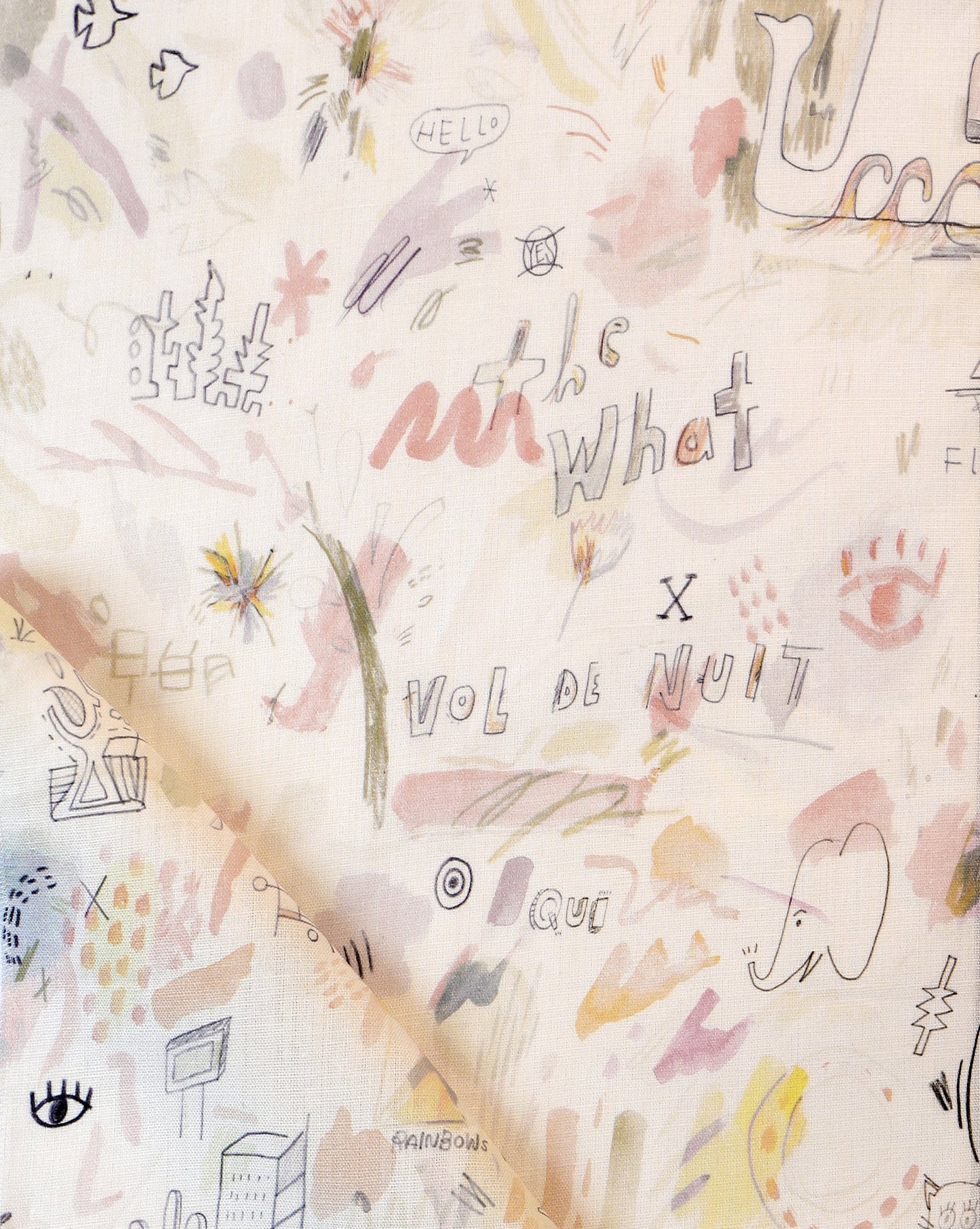 A piece of Vol de Nuit Fabric Sunshine with Eskayel drawings on it