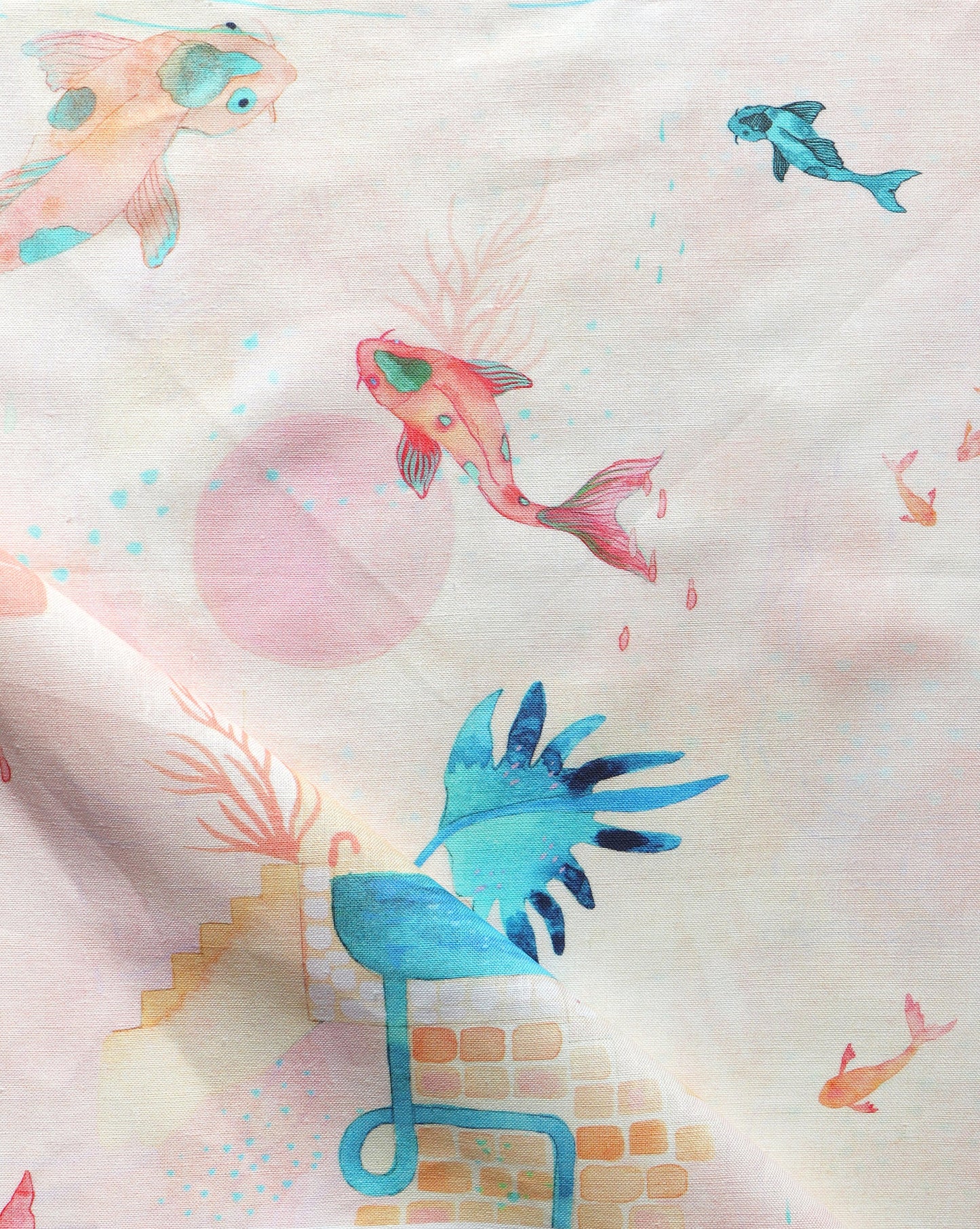 A pink and blue Water Signs Fabric Multi with koi fish on it