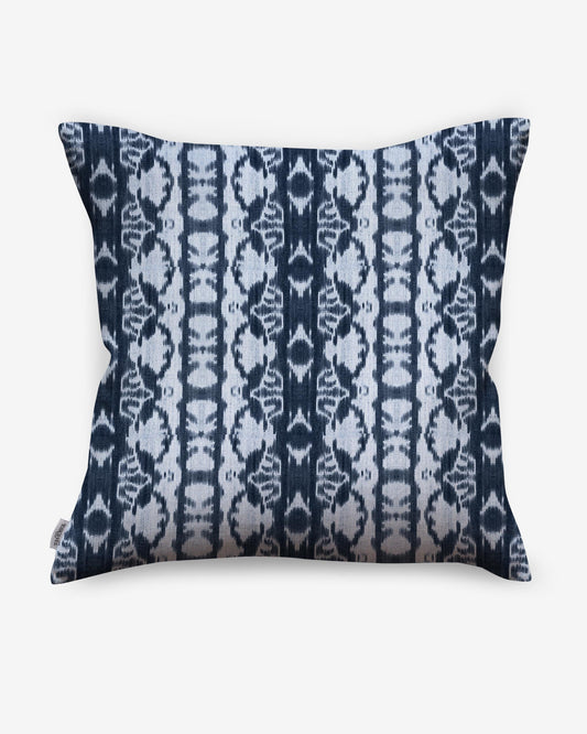 A blue and white Bali Stripe Pillow with an abstract Bali Stripe pattern