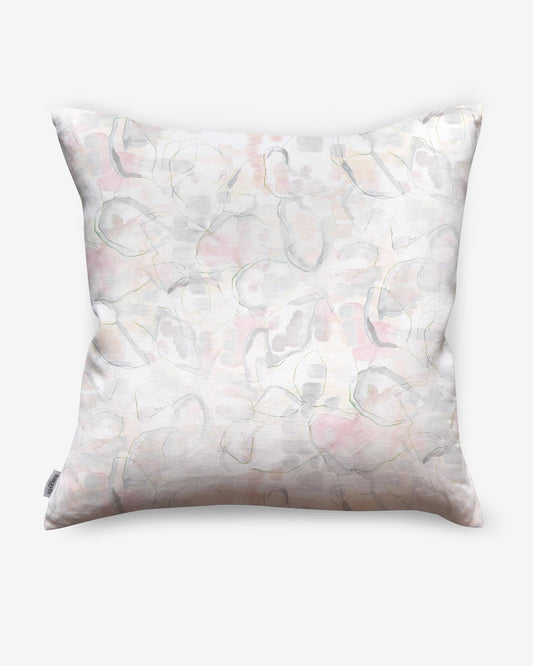 A Canopy Pillow with a pink and white abstract pattern