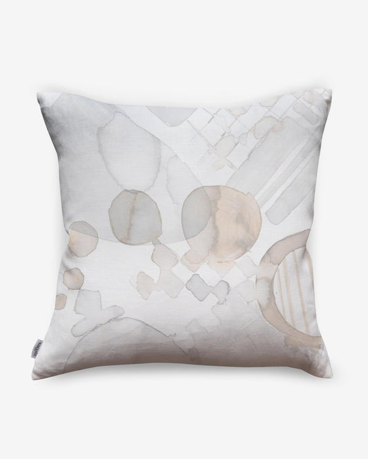 A Sea Galaxy Pillow Coral with a white and beige mural artwork