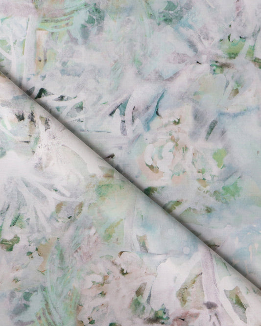 A close up of a Cortile Performance Fabric Verde with a Verde green and white floral print