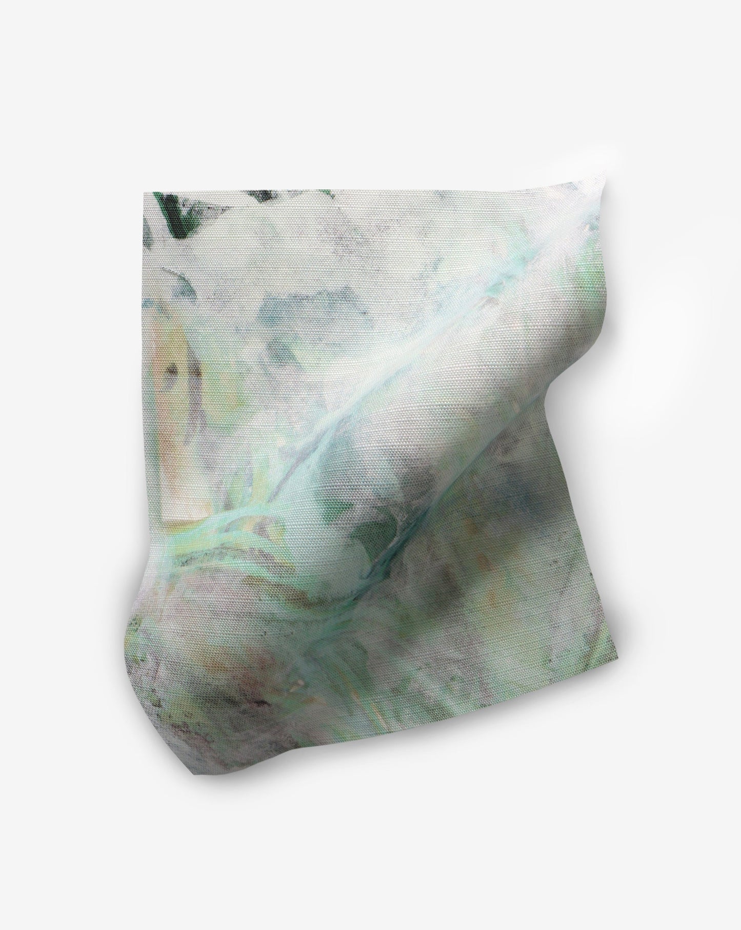 A piece of Cortile Performance Fabric Verde with a green and blue pattern on it
