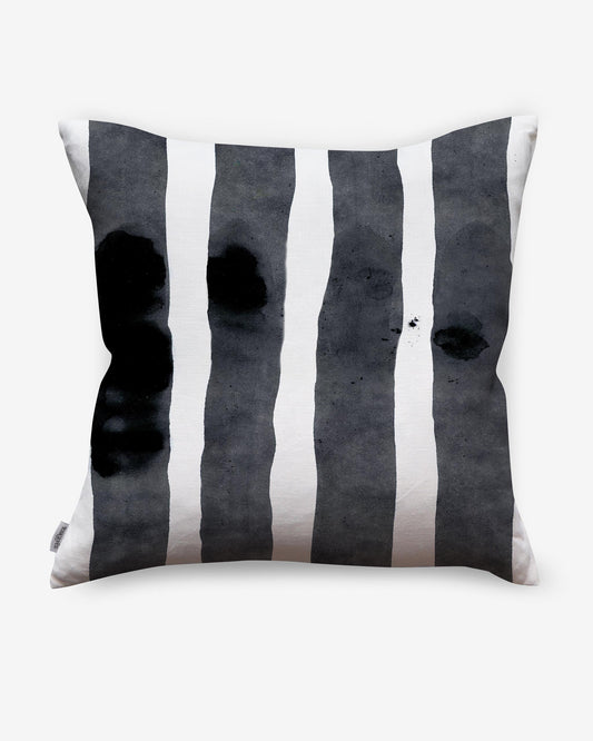 A Bold Stripe Outdoor Pillow Slate with black and white stripes on it