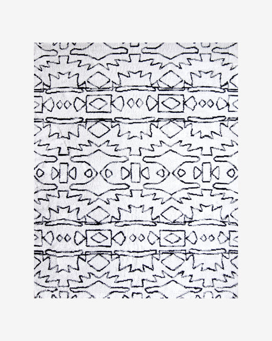 A versatile Akimbo Hand Knotted Rug  Black And White with a graphic geometric pattern on a white background