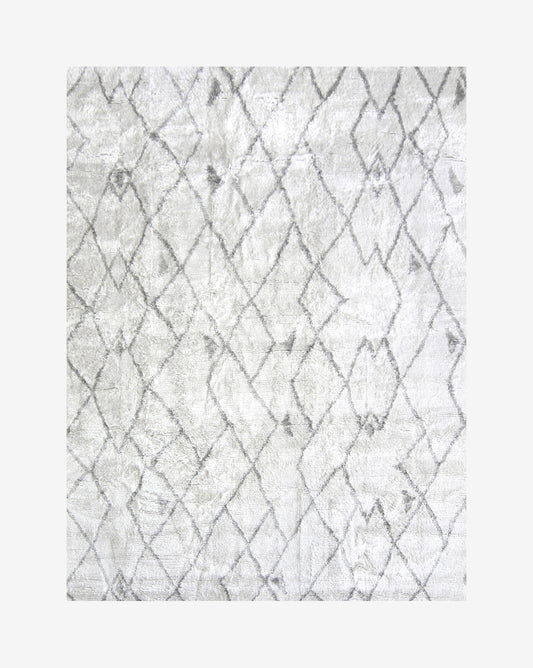 A white and gray Peaks Hand Knotted Rug Grey with a geometric design, hand-knotted composition, inspired by Shanan Campanaro