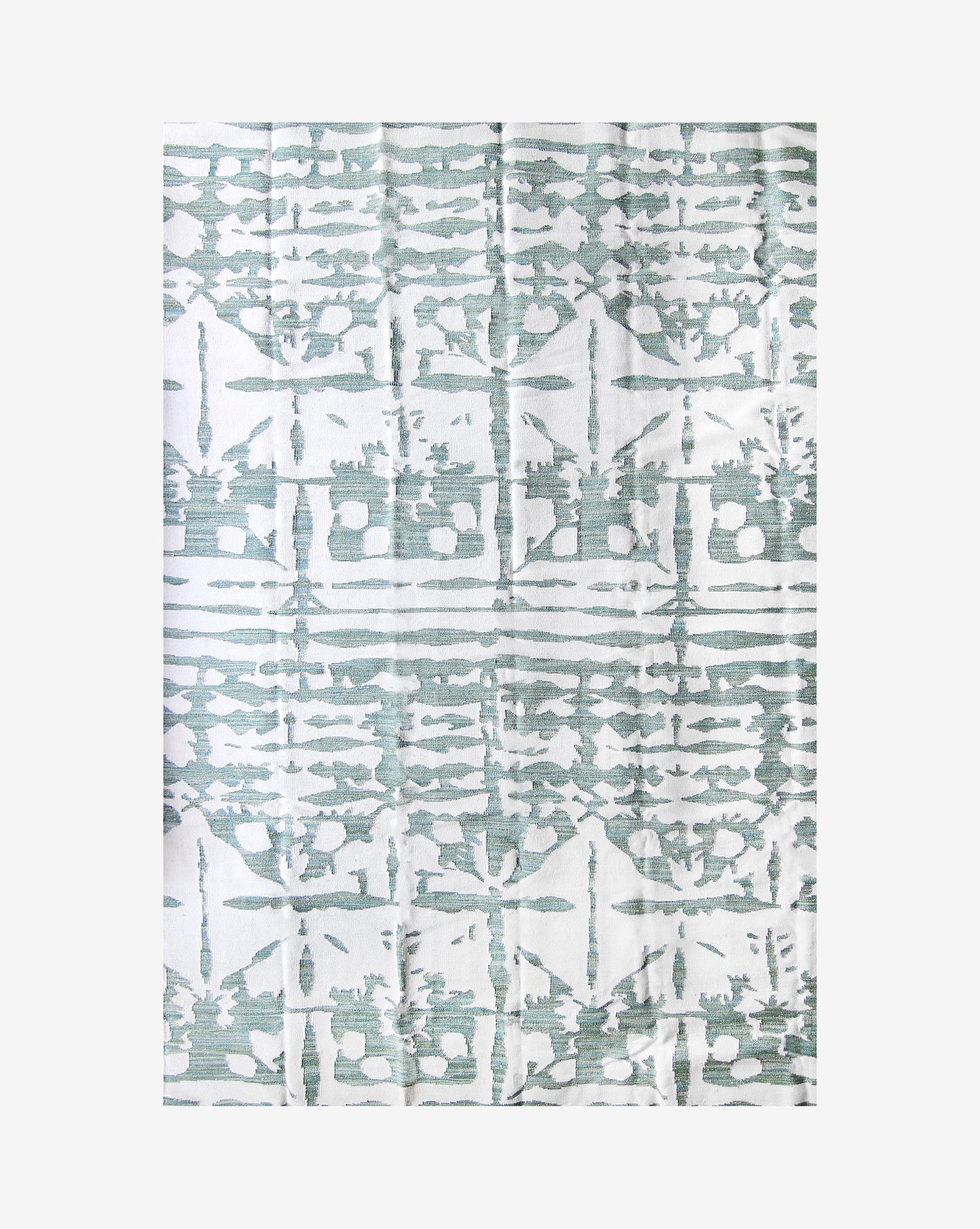 A blue and white Banda Flatweave Rug Chloros with geometric designs on it