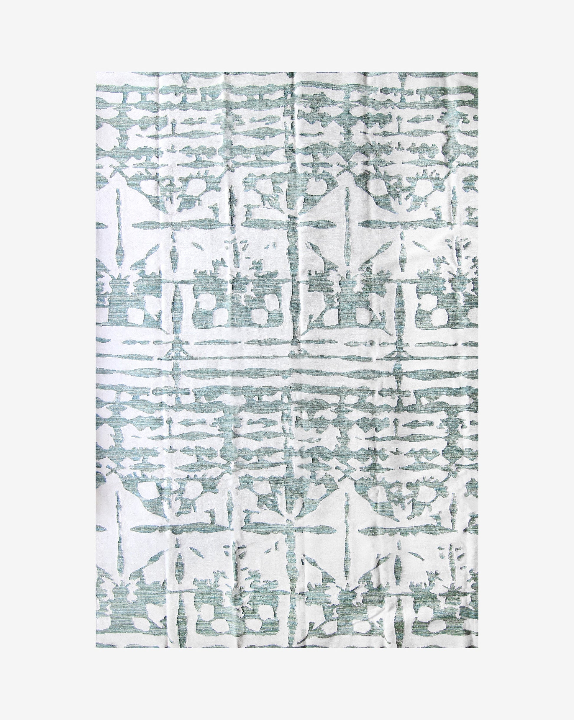A blue and white Banda Flatweave Rug Chloros with geometric designs on it