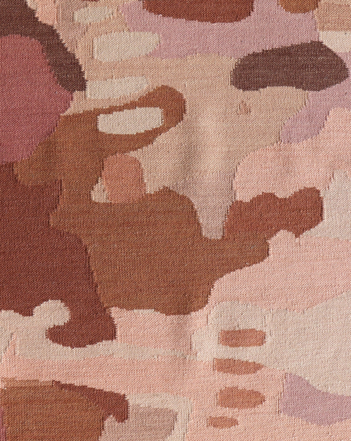 A close up of a pink, brown, and beige Kotoubia Flatweave Rug Morinda