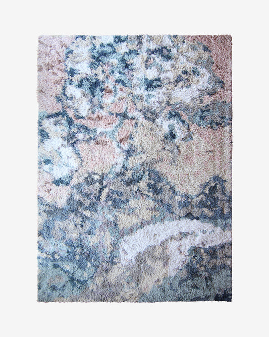 A luxury handmade Balboa Hand Knotted Rug Multi from the Presidio Collection with a Balboa design on it