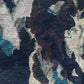 A close up of a Huerfano Hand Knotted Rug Navy from the Presidio Collection