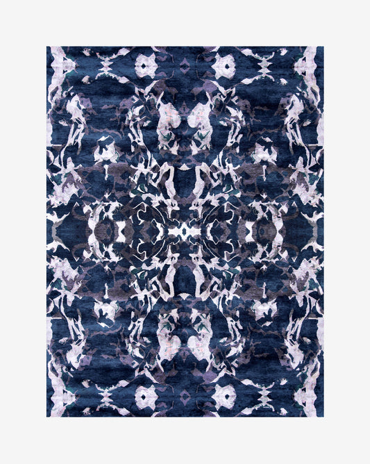 A navy Huerfano Hand Knotted Rug from the Presidio Collection, custom handmade by Eskayel