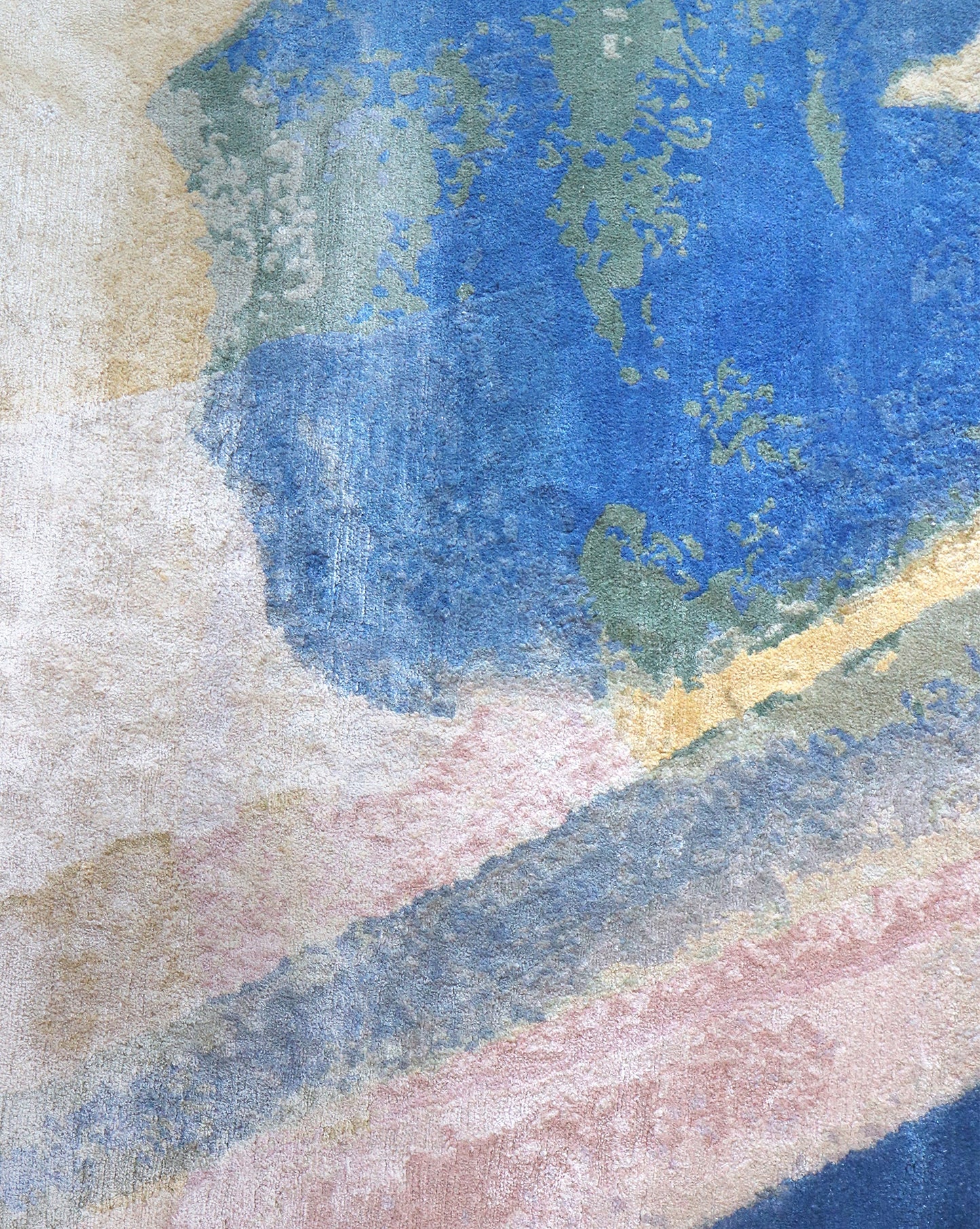 A painting with an abstract design and a Lilys View Hand Knotted Rug Dawn background