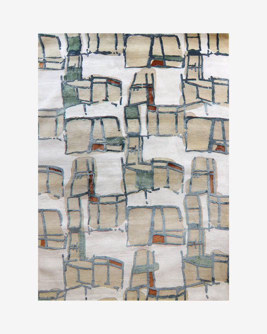 A Quotidiana Hand Knotted Rug with an abstract design on it