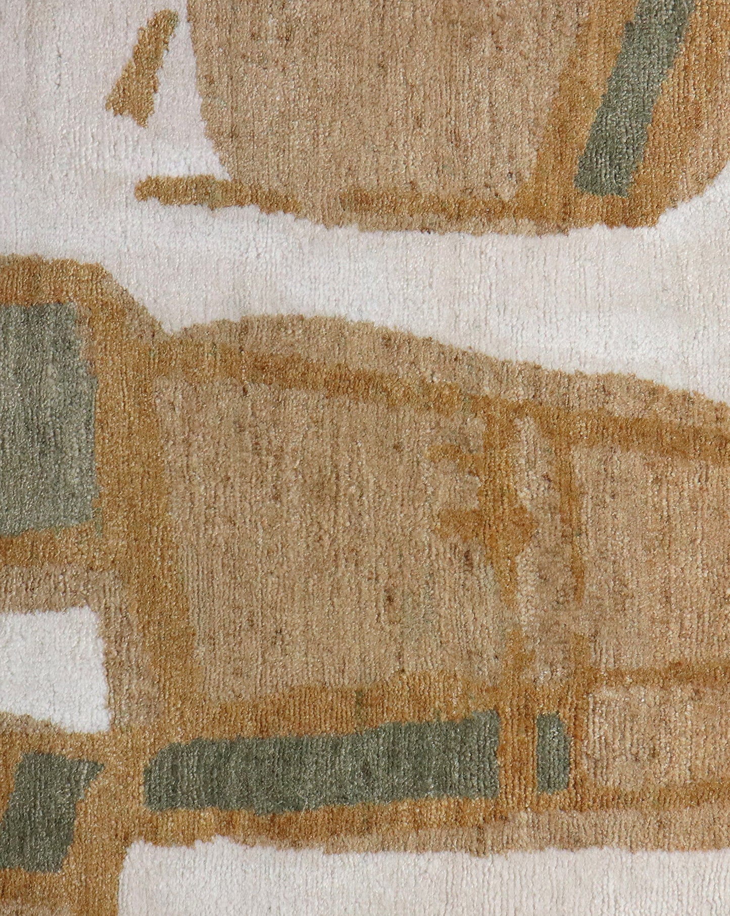 A close up of a Quotidiana Hand Knotted Rug in Sage