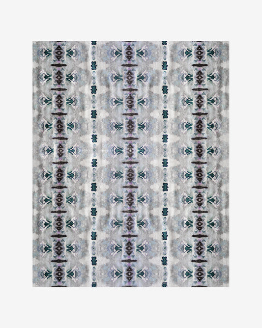 A grey and blue Septaria Hand Knotted Rug Light with a pattern on it