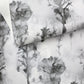 A black and white print of trees on a piece of Aionas Wallpaper