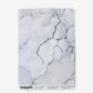 A magazine with an Aquarelle Wallpaper Ice cover that exudes a high-end and luxurious ambiance