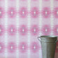 A pink and white Areca Palms Wallpaper Yam in front of it
