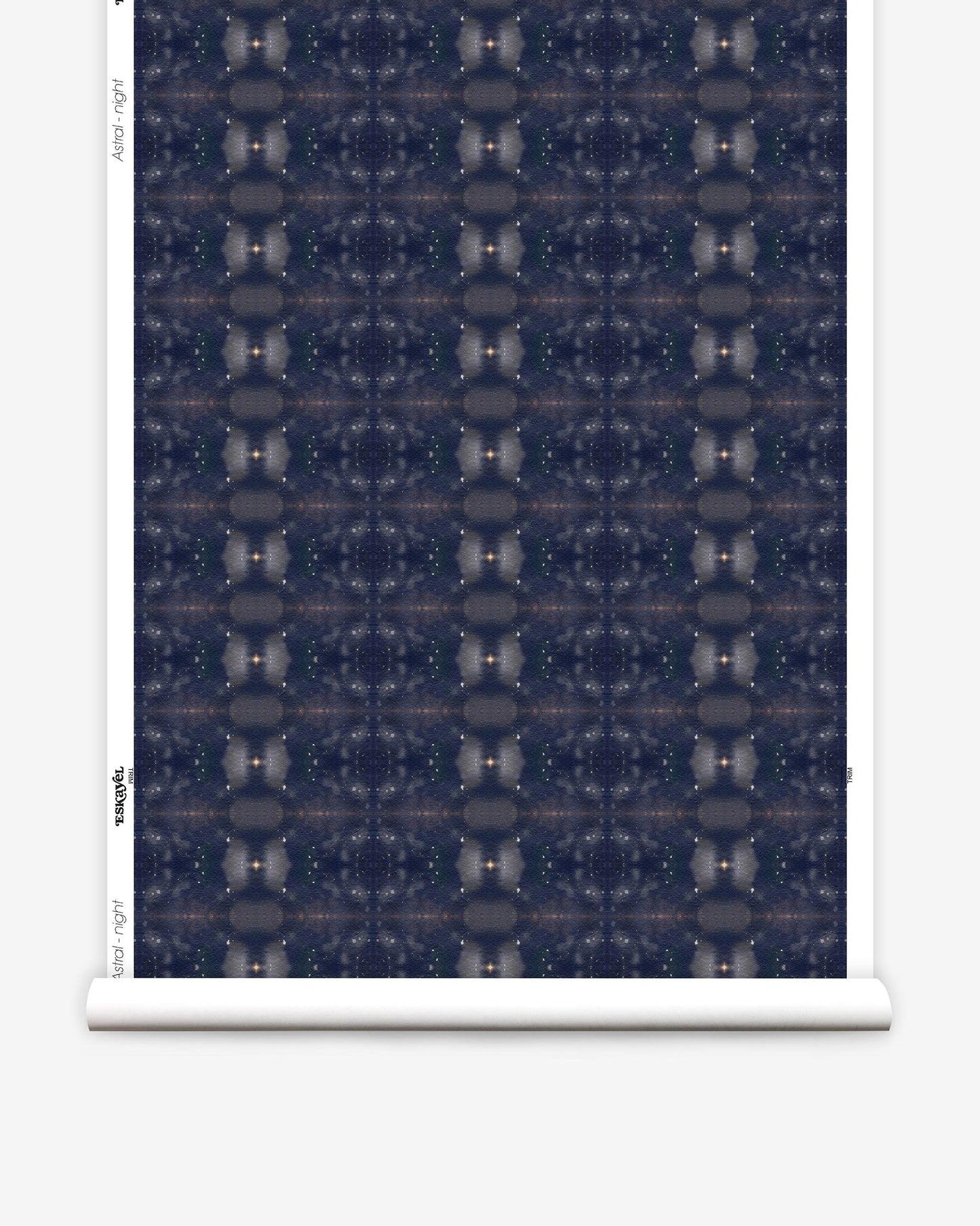A roll of Astral Wallpaper Night from the Jangala Collection with a dark blue pattern on it