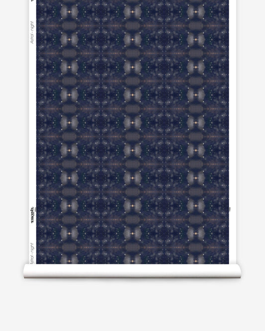 A roll of Astral Wallpaper Night from the Jangala Collection with a dark blue pattern on it