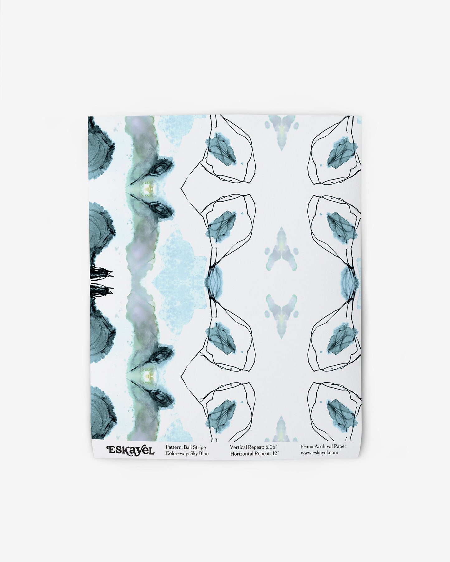 A luxurious fabric adorns a Bali Stripe Wallpaper Sky Blue