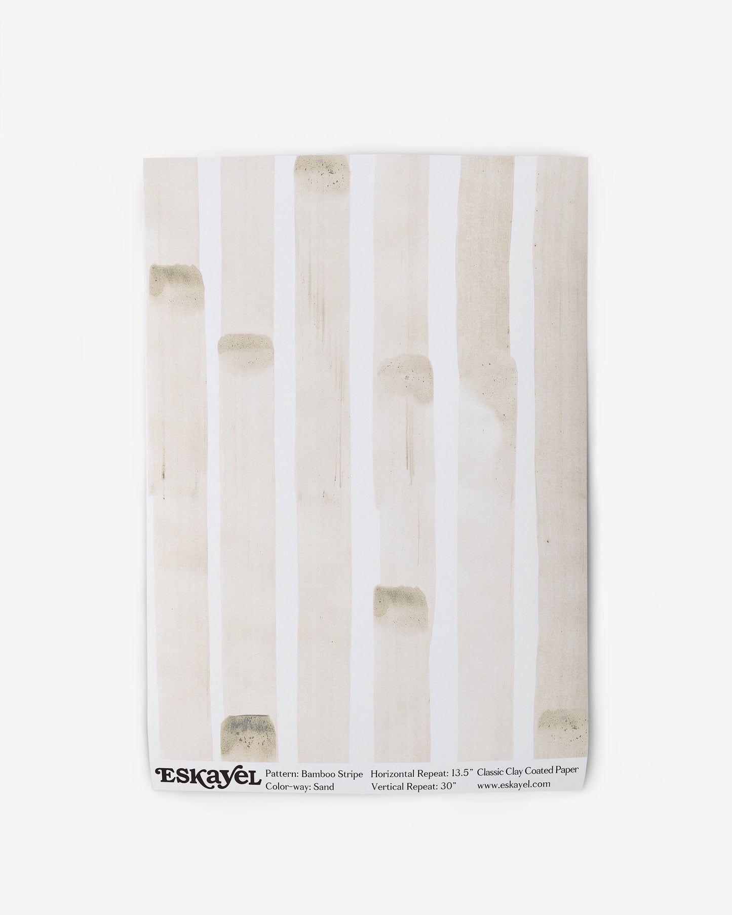 A white wallpaper with a beige stripe from the Bamboo Stripe Wallpaper Sand range