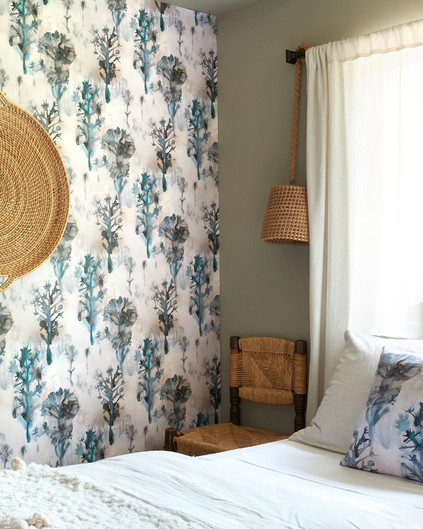 A bed with Aionas Wallpaper or Isthmus