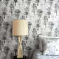 A bedroom with Aionas Wallpaper Phyllite