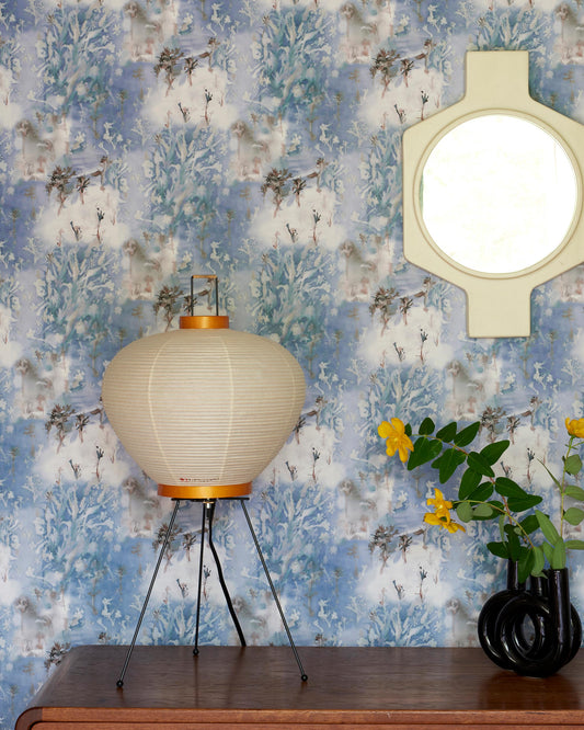 A Emvasia Wallpaper Thalassa on a table next to a mirror
