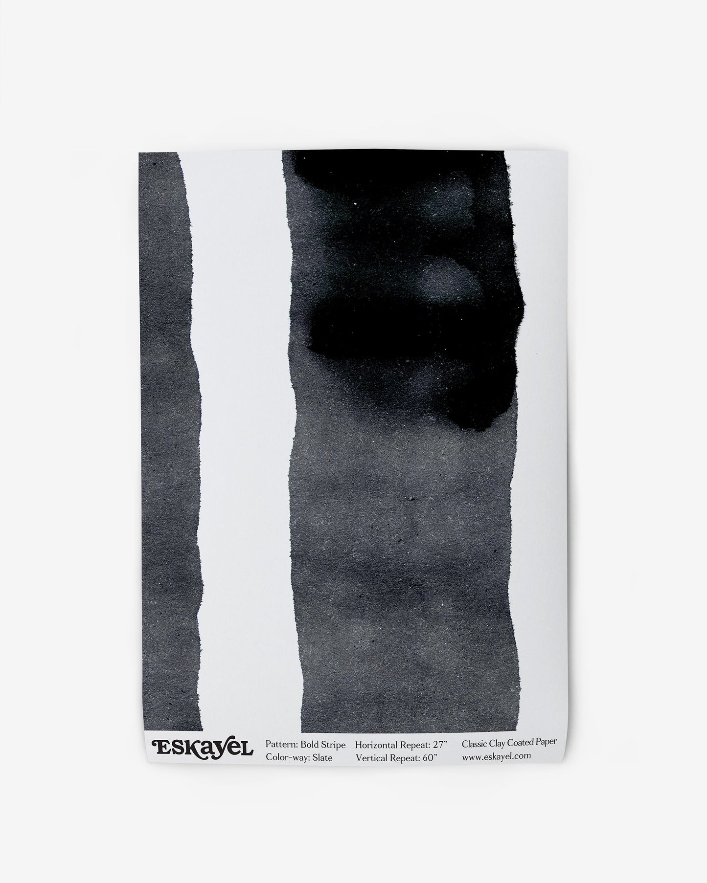 A sample with Bold Stripe Wallpaper Slate on a fabric background
