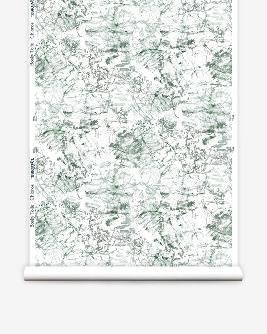 A high-end wallpaper, Bosky Toile Wallpaper Chloros, featuring a luxury fabric in green and white on a roll