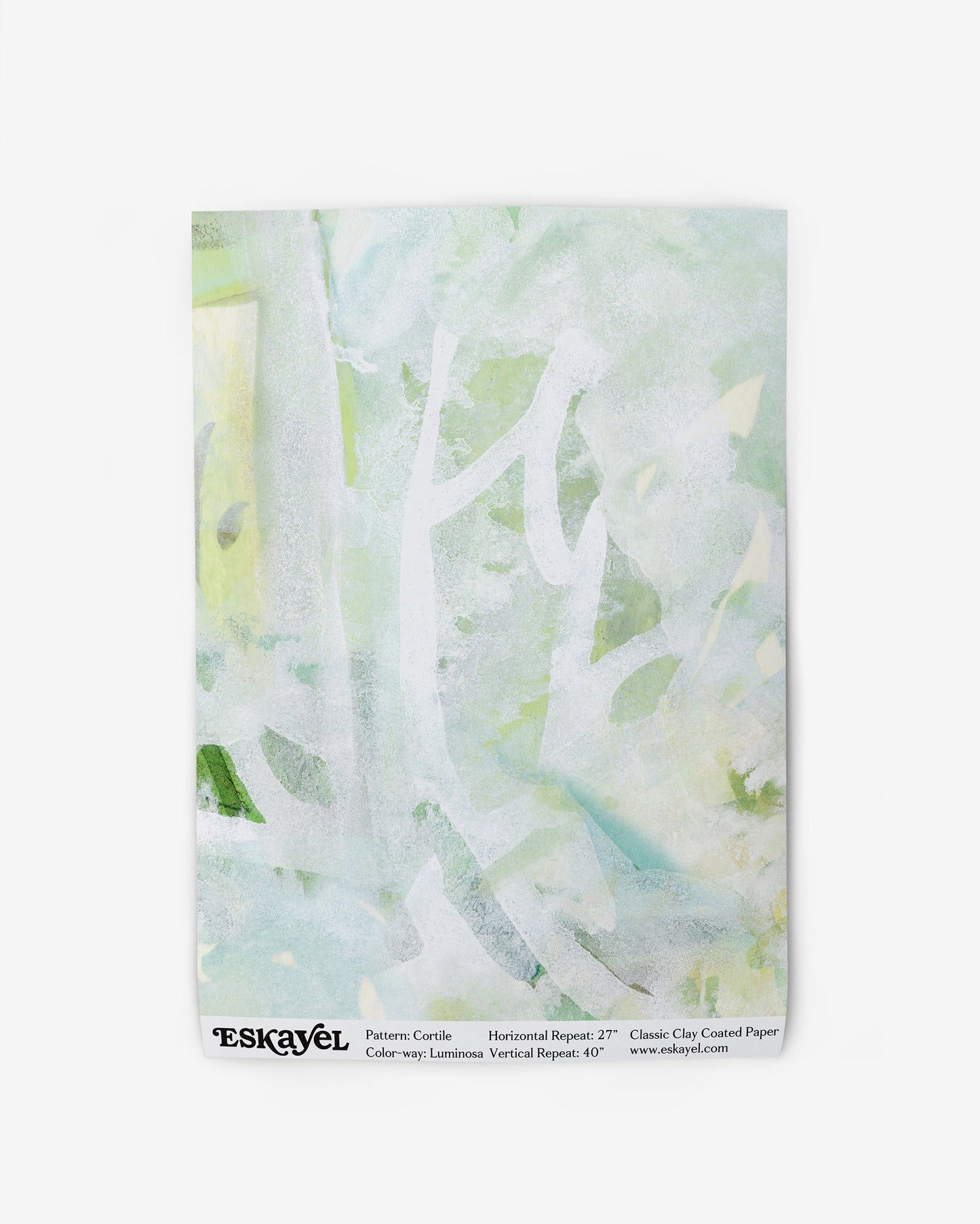 A white Cortile Wallpaper with a green and white painting on it