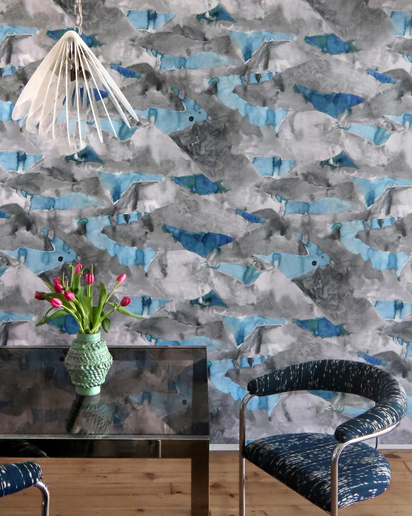 A blue and white Mani wallpaper in a dining room