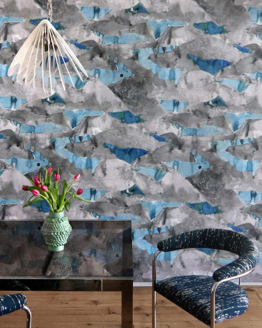 A blue and white Mani wallpaper in a dining room
