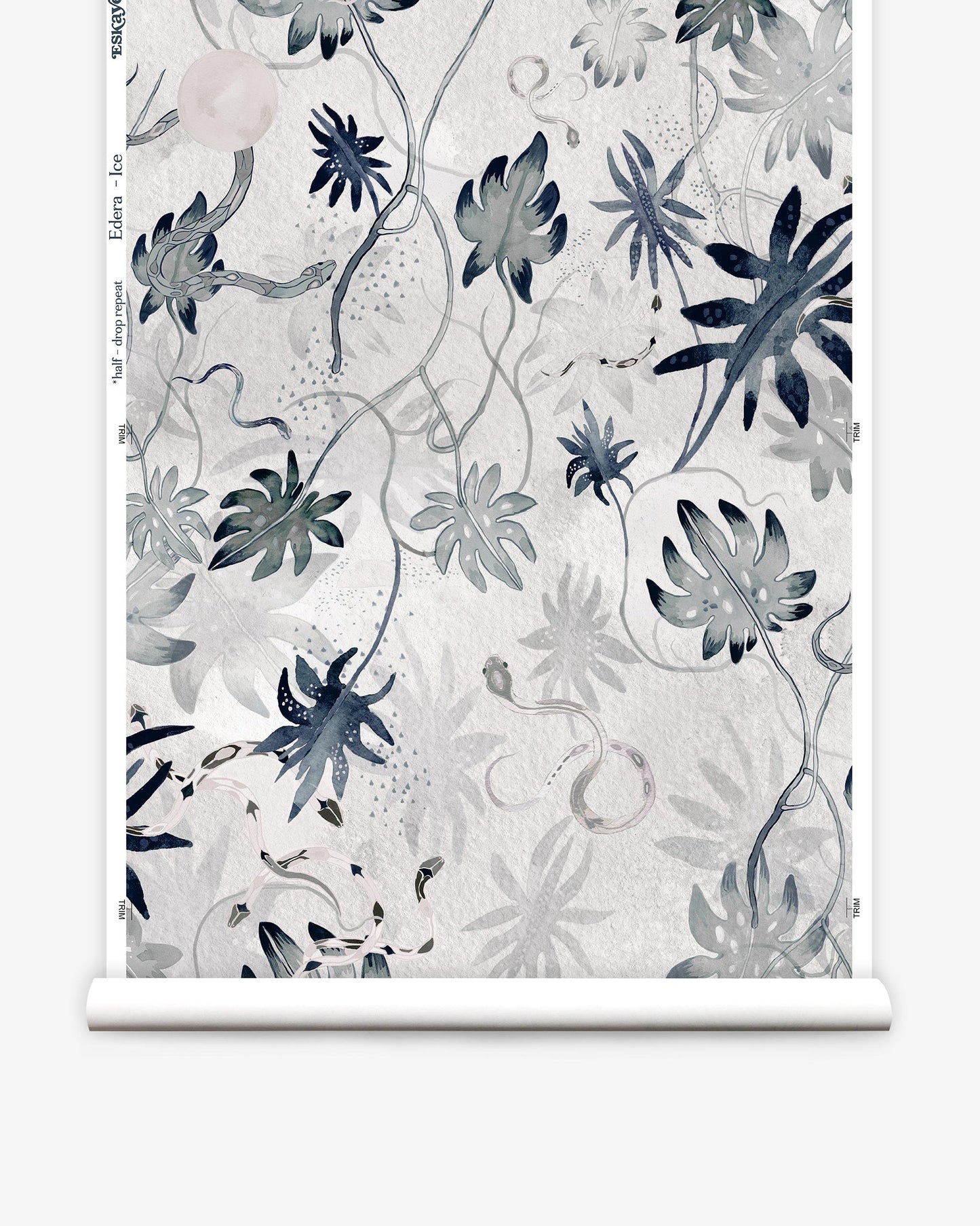 A roll of Edera Wallpaper Ice collaboration wallpaper with a blue and white floral pattern