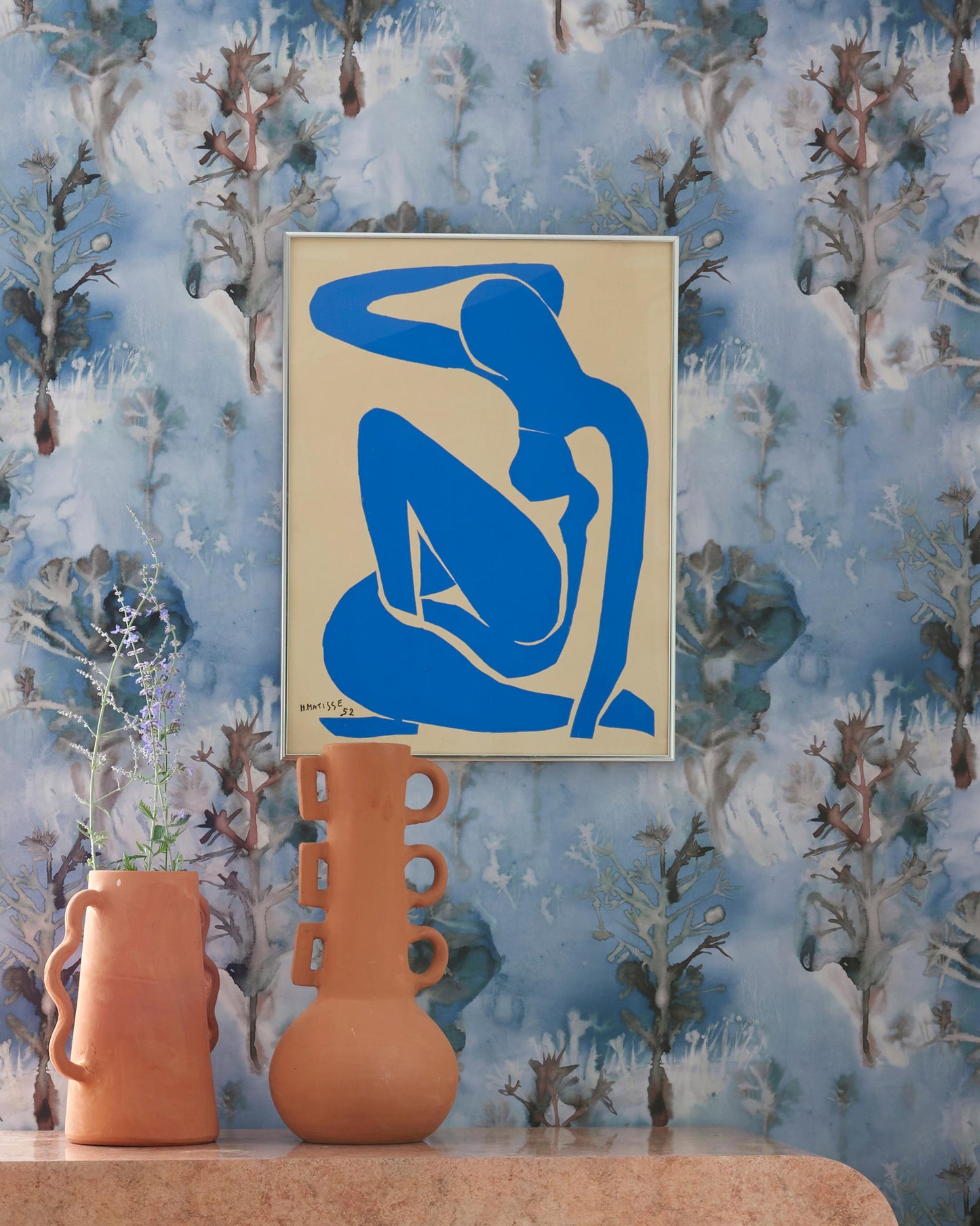 A vase with a Aionas Wallpaper in front of high-end wallpaper A vase with a Thalassa in front of high-end wallpaper