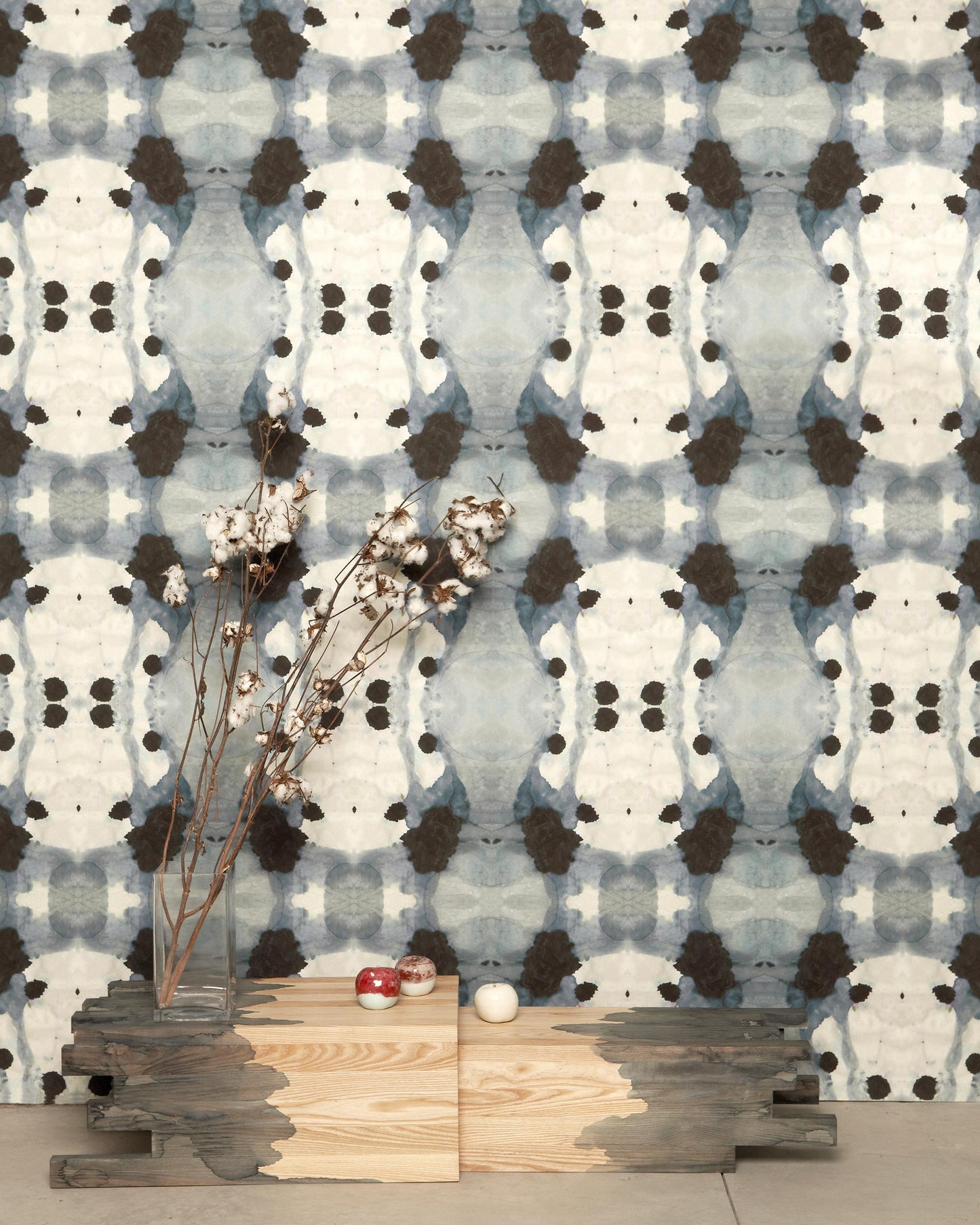 A blue and white Dynasty Wallpaper Slate with a vase in front of it