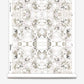 A roll of Huerfano Wallpaper Sol with a white and grey Huerfano design, from the Presidio Collection