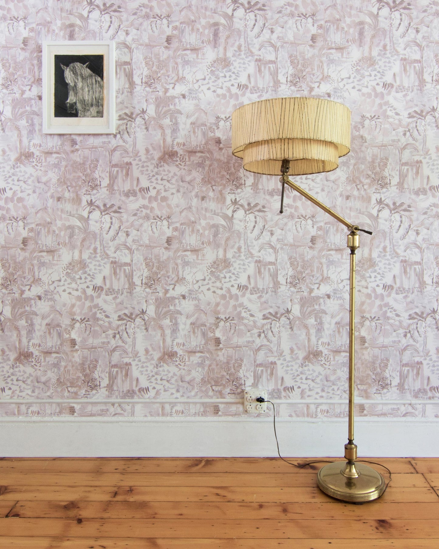 A floor lamp in a room with Souk Wallpaper||Pausa.