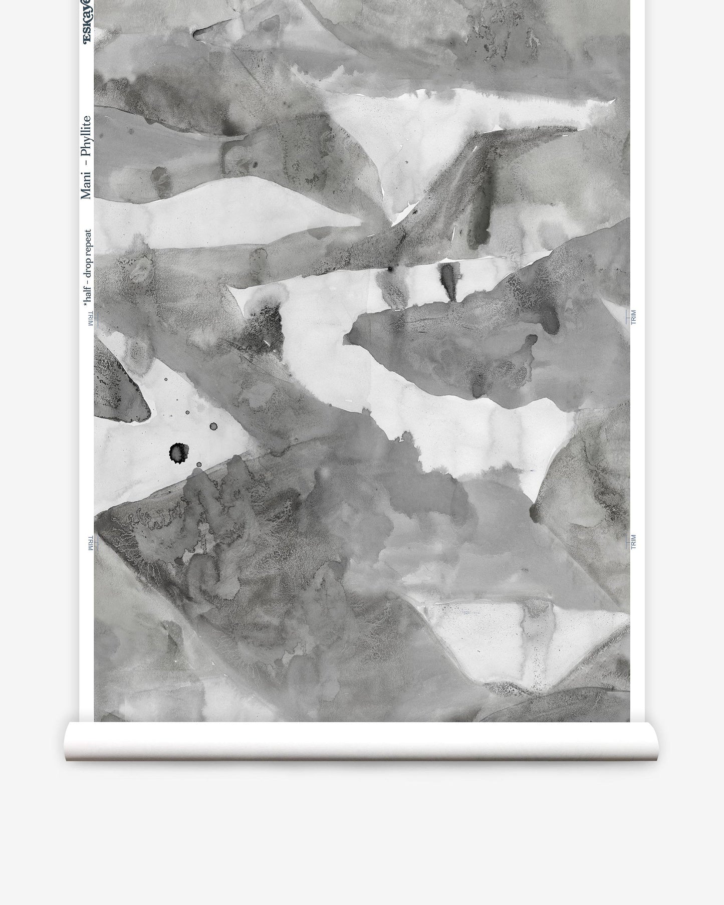 A black and white Mani Wallwallpaper Phyllite on a roll of wallpaper