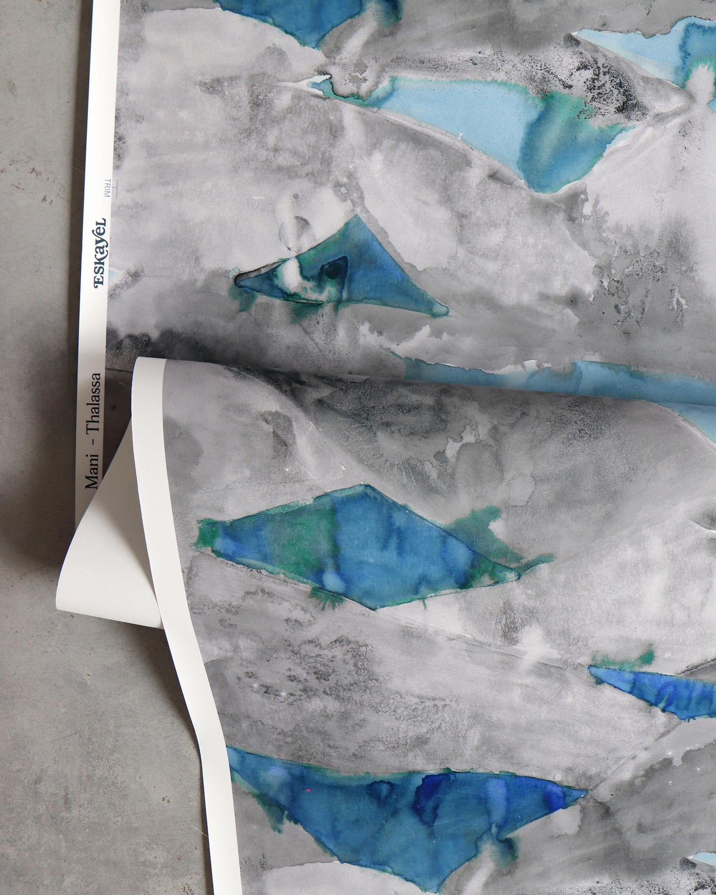 A blue and white Mani Wallpaper representing Thalassa