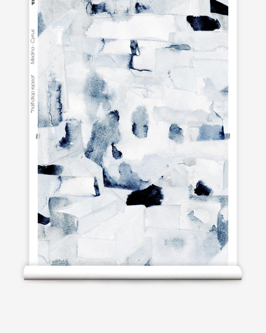 A blue and white watercolor painting on a roll of Medina Wallpaper featuring Marrakesh roofs